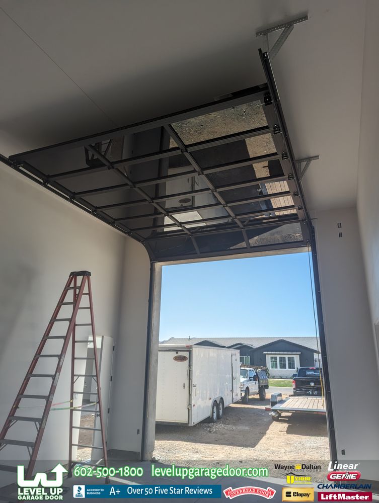 Garage door installation in progress at an East Valley home